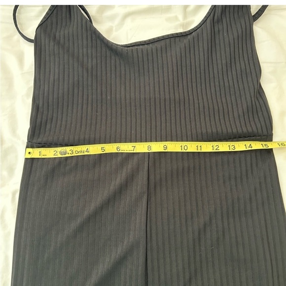 Pretty Little Thing black romper/jumper.
Spaghetti straps size 12 - Picture 5 of 7